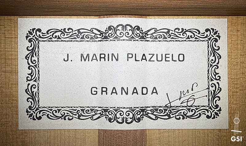The label of a 1999 Jose Marin Plazuelo flamenco guitar made of spruce and cypress