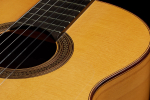 The top and side of a 1999 Jose Marin Plazuelo flamenco guitar made of spruce and cypress